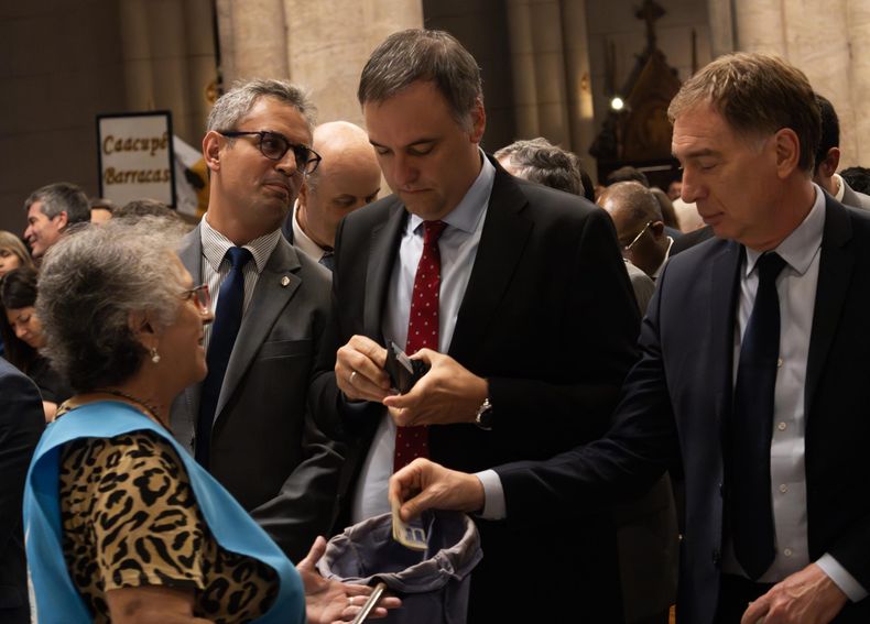 Menem, Adorni y Santilli.