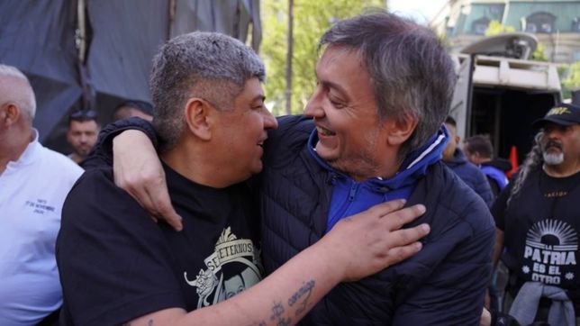 abrazo kirchner-moyano detras del escenario y un falso evita en la plaza