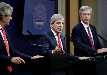 Juan Pazo, titular de la ARCA, Toto Caputo y Santiago Bausili&nbsp;