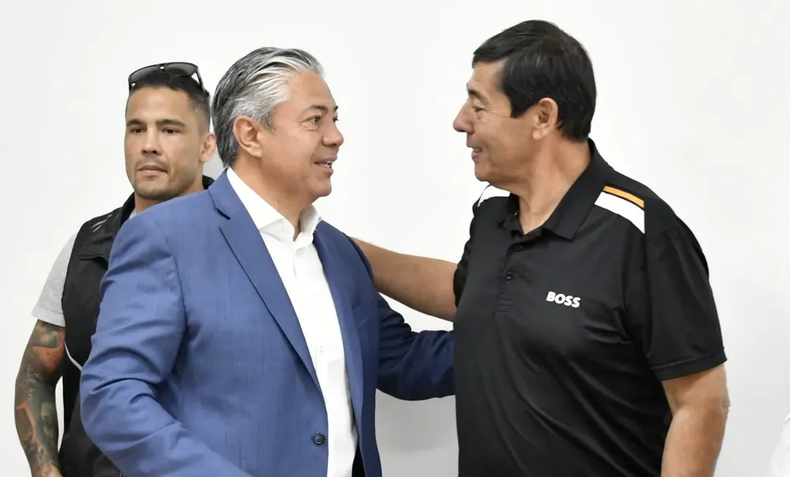 El gobernador de Neuquén, Rolando Figueroa, y el dirigente petrolero Marcelo Rucci.