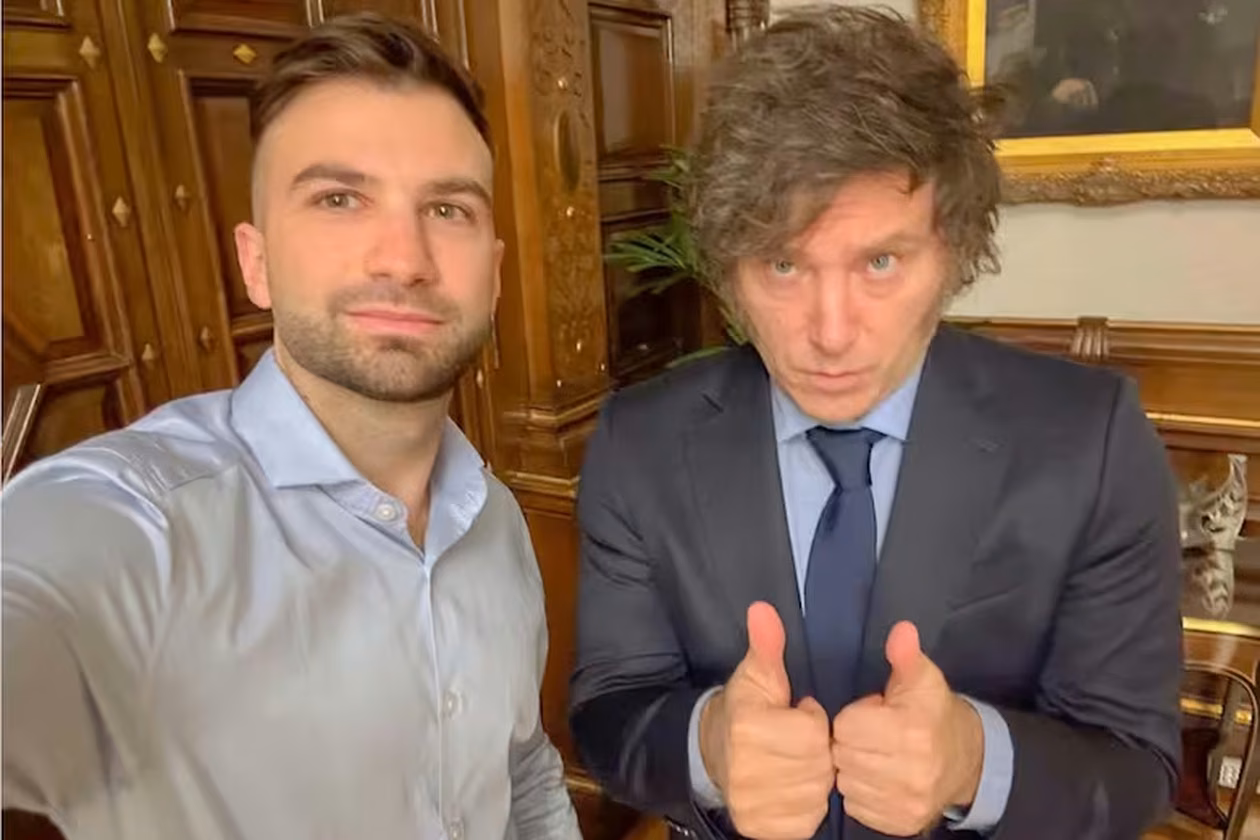 Javier Mileio con Mauricio Novelli.