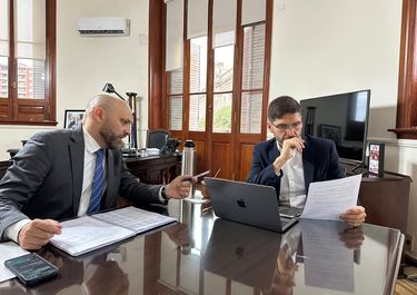 El gobernador de Santa Fe, Maximiliano Pullaro, y el ministro Gustavo Puccini