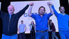Sáenz festeja junto al vicegobernador Marocco y a Durand, el nuevo intendente de la capital salteña.