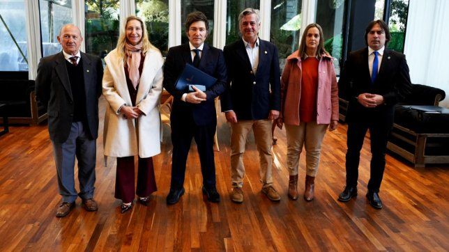 Javier y Karina Milei con Nicolás Pino.