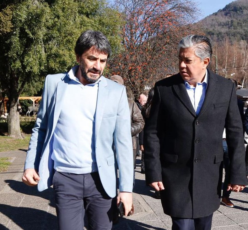 Carlos Saloniti y Rolando Figueroa tienen una fluida comunicación.