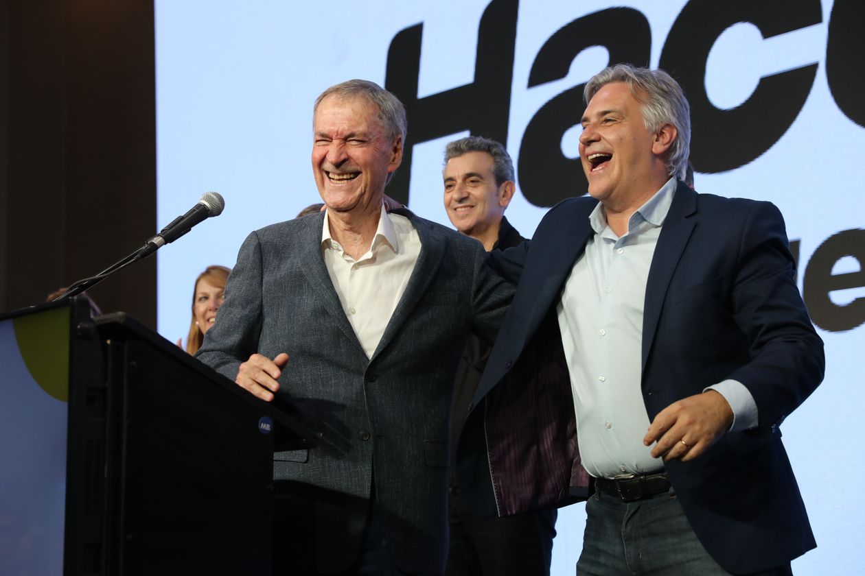Juan Schiaretti y Martín Llaryora.