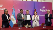 Mauricio Macri en su última visita a Santa Fe, junto Gisela Scaglia y Cristian Cunha, el candidato de Federico Angelini.