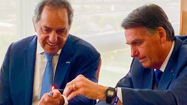 el exilio de daniel: corrido por massa, scioli vuelve a brasil