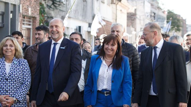 Celia Arena, la espada política del gobernador, junto a sus pares de gabinete y lista, Marcos Corach y Sonia Martorano.