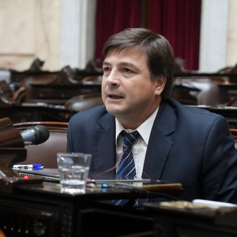 Morchio, ocupando su banca en la cámara de Diputados.
