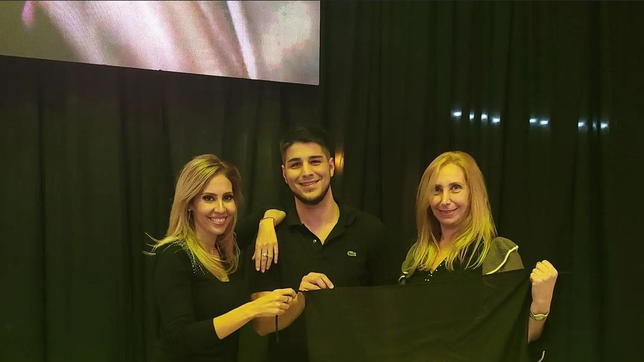 Agustín Pellegrini, el candidato libertario en Santa Fe, junto a Romina Diez y Karina Milei.