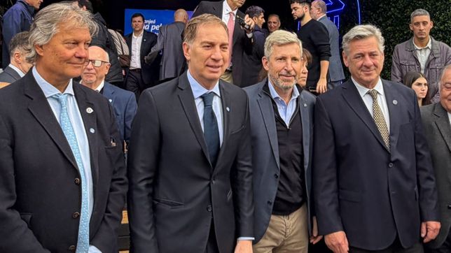 Rogelio Frigerio lanzó el primer seguro multirriesgo para el maíz. En la foto, junto a Diego Santilli y Nicolás Pino.