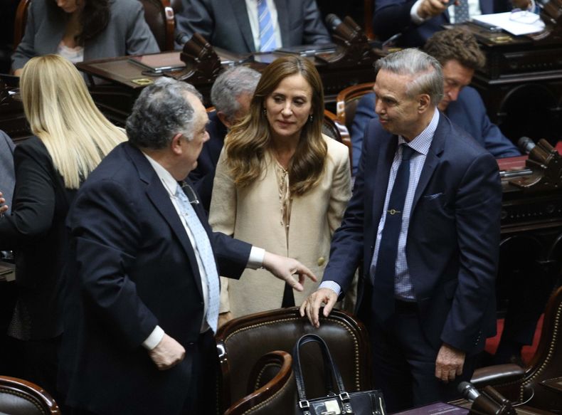 Eduardo Valdés, Victoria Tolosa Paz y Miguel Ángel Pichetto.