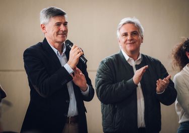 Daniel Passerini con Martín Llaryora