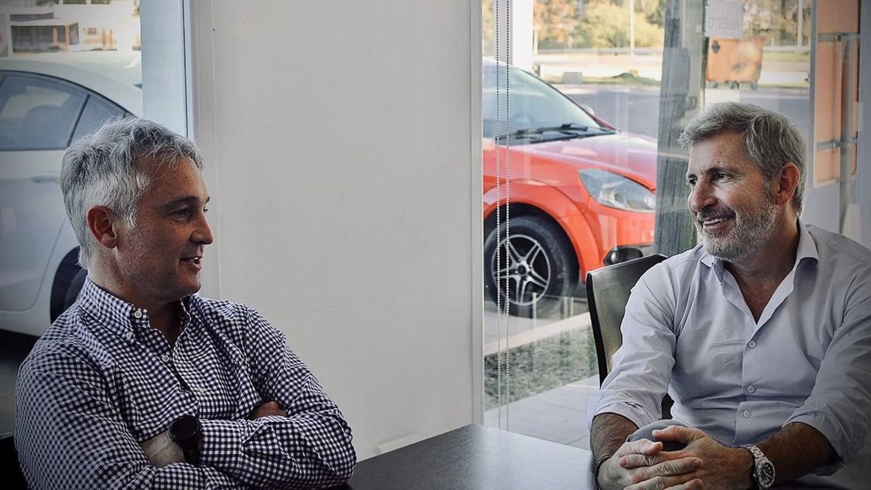 Rogelio Frigerio junto a Fernando De Andreis.