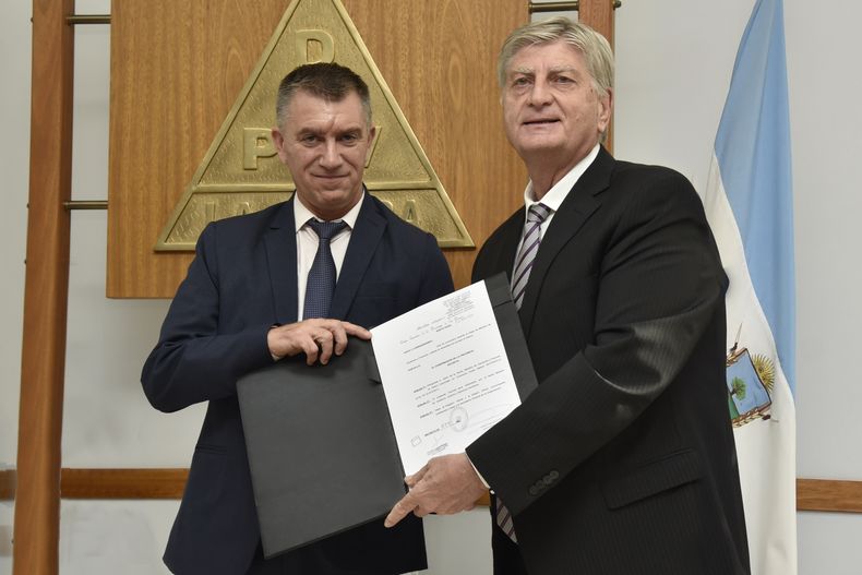 El gobernador de La Pampa, Sergio Ziliotto, junto a su ministro de Economía Guido Bisterfeld: monitorean la negociación por los fondos previsionales.