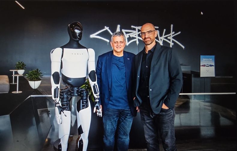 Horacio Marín, de YPF, junto a Michael Snyder, de Tesla.