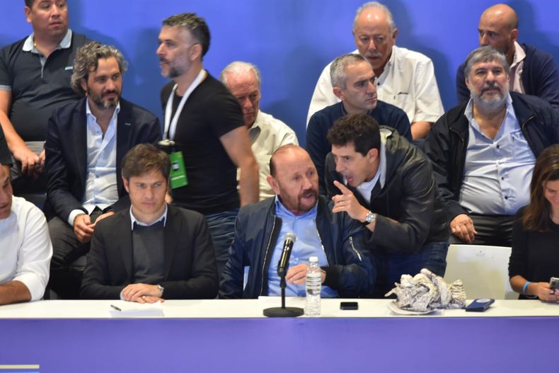 Axel Kicillof, Gildo Insgrán y Edaurdo de Pedro. Atrás, Santiago Cafiero.