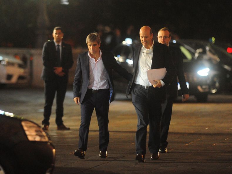Toto Caputo y Federico Sturzenegger.
