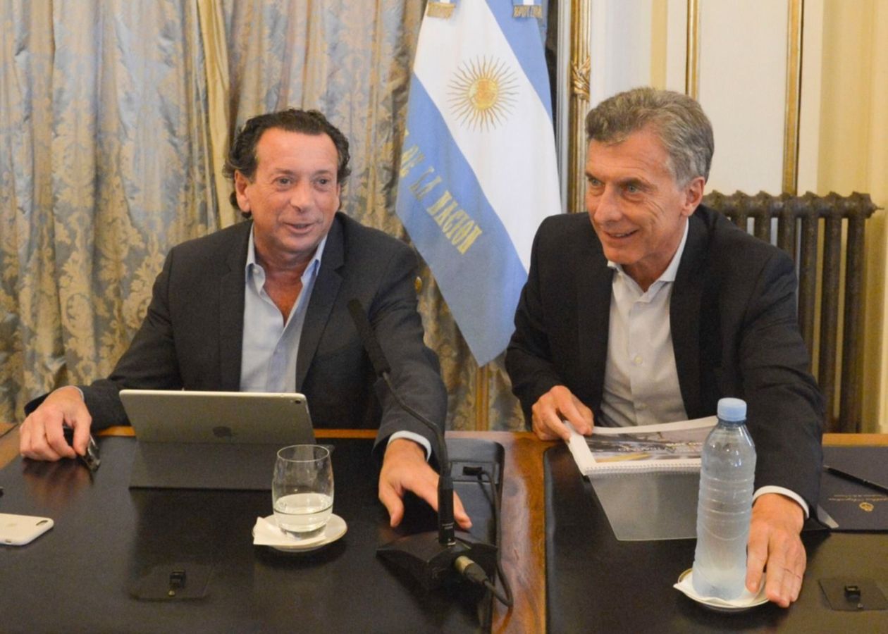 Dante Sica y Mauricio Macri
