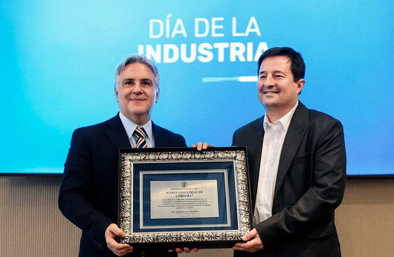 Martín Llaryora y José Maria Manuali, presidente de la Unión Industrial de Córdoba